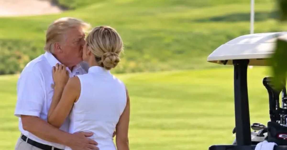 White House responds to viral photo appearing to show Trump kissing aide